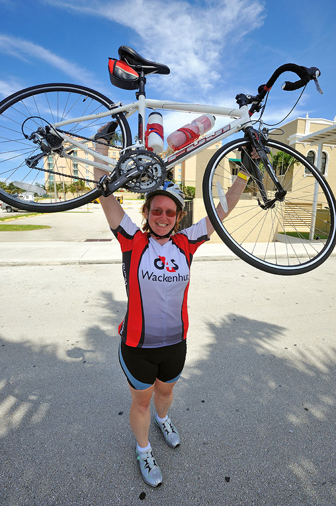Laura at the Finish Line of Her First Bike Century Ride.