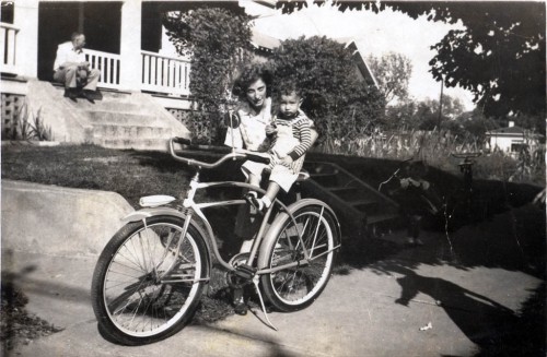 Lucille Hoffman Perry holds Jerry Hoffman, her nephew on bike