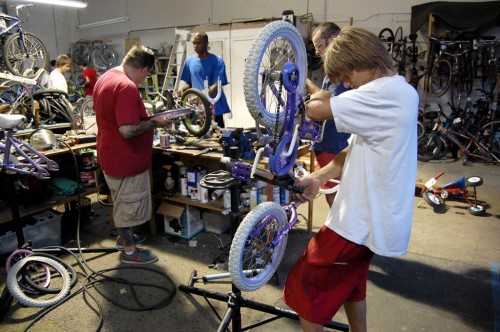 The West Palm Beach Freakbike Militia fixing bikes for Jack the Bike Man