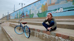 Amy Murphy on Mississippi River bank in Cape Girardeau, MO, with her Tahiti bike