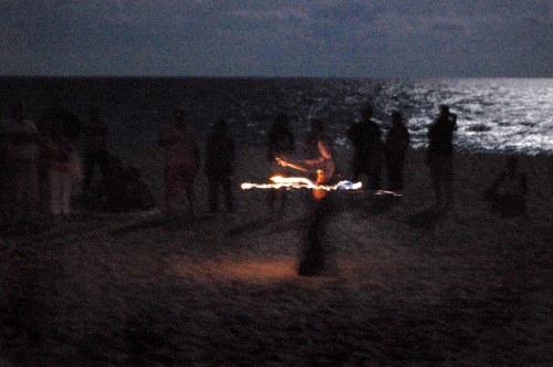 Fire dancer on Lake Worth (FL) Beach during Full Moon Drum Circle