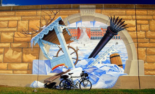 Surly Long Haul Trucker in front of mural showing Mississippi River clogged with ice in 1918