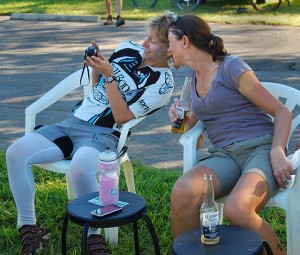 Lynn and Pam look at pictures from the Lake Okeechobee Big Adventure ride